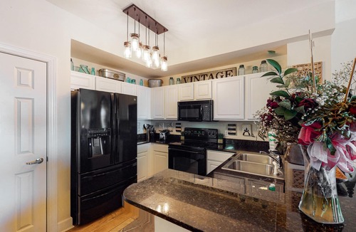 Panama City Beach Condo | Richly designed beachfront condo with pools, hot tub, gym & amazing views