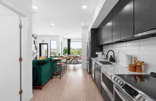 North Capitol House | River View High-End Condo with Private Patio and FREE Parking