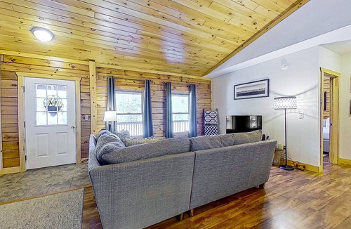 Warrensburg House | Riverfront dog-friendly house near skiing with firepits, wood stove & beach