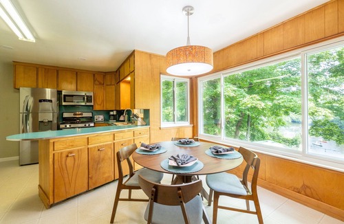 Dexter House | Riverside retreat with hot tub on the Huron River! 10 miles to UofM!