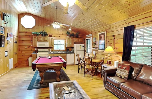 Sevierville Cabin | Romantic escape in the woods w. hot tub, fireplace + indoor pool access
