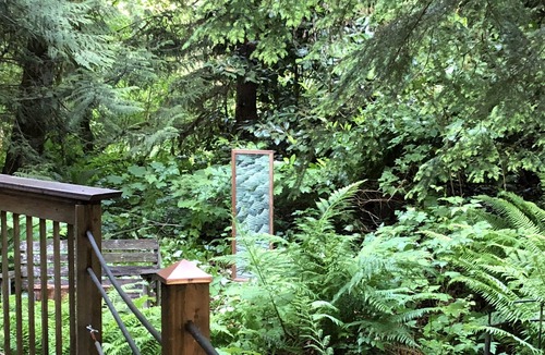Gold Bar Cabin | Rustic Cedar Cabin on the River beneath Mt Index with intimate Hot Tub