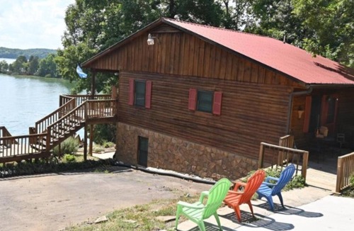 Ten Mile House | Scenic lake house with private covered dual-slip and two covered lake-view decks