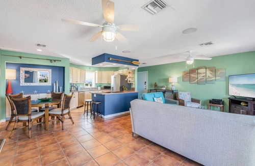 New Town Condo | SEA-NIC VIEW ~ 2 BR/2Ba Water-front views, Heated Pool Access and Dockage!
