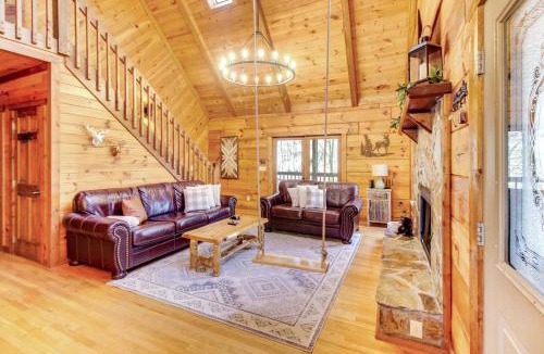 Cherry Log House | Secluded Cherry Log Cabin with Hot Tub and Swings!