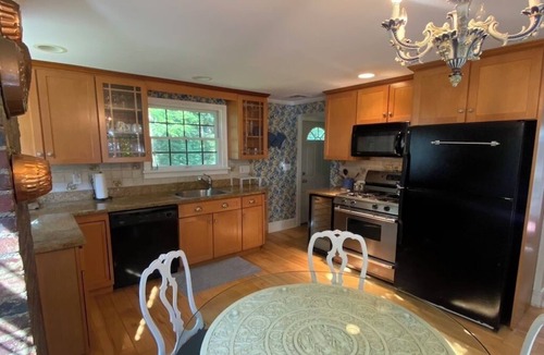 Laurel Hollow Cottage | Secluded, private woodland cottage with two bedrooms and stone patio for summer!