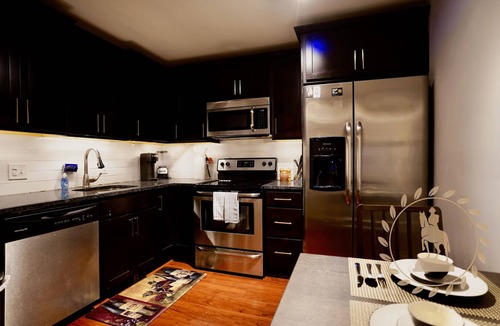 Downtown Baltimore Apartment | Secure Condo w/Paid Garage Parking, Free WiFi and Monthly Discounts - UB & MICA