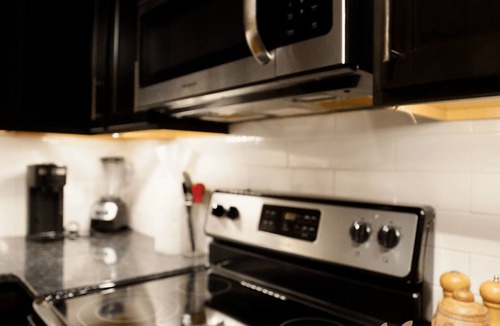 Downtown Baltimore Apartment | Secure Condo w/Paid Garage Parking, Free WiFi and Monthly Discounts - UB & MICA