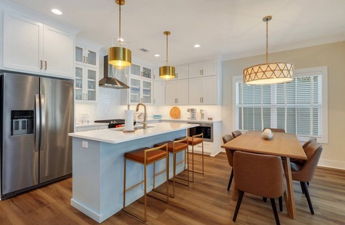 Saint Simons Heights House | Serenity Oasis - Villa 1 - Professionally Designed Duplex Home with Luxurious Heated Pool and Spa!