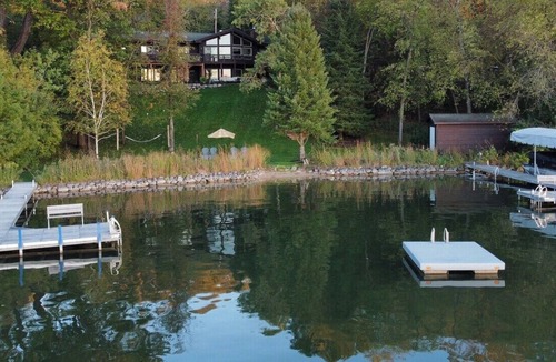 Whitewater House | Spacious, Upscale Whitewater Lake Home |200+ Ft of Lake Frontage |Swim Deck |Docks |Screened Porch
