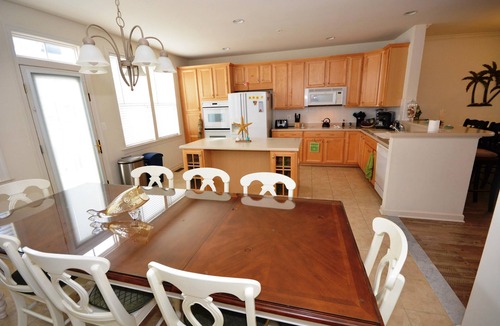 Sunset Island House | Splendid Luxury 5 Bedroom Townhouse with WiFi In Gated Community On Bayside With Indoor/Outdoor Pools, Private Beaches, Restaurant, And More Just Ten Minutes From Beach!