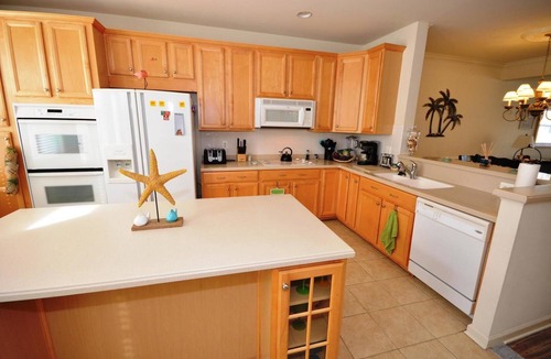 Sunset Island House | Splendid Luxury 5 Bedroom Townhouse with WiFi In Gated Community On Bayside With Indoor/Outdoor Pools, Private Beaches, Restaurant, And More Just Ten Minutes From Beach!