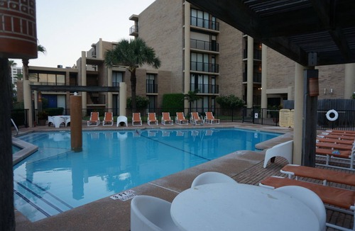 South Padre Island Condo | Stunning Beach Front Ground Floor 3/2 Condo. A Few Steps To The Beach!