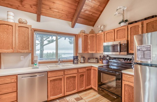 Sandpiper Village House | Stupendous Views Over Forest to Sea, Hot Tub, and game room in This Family Home!