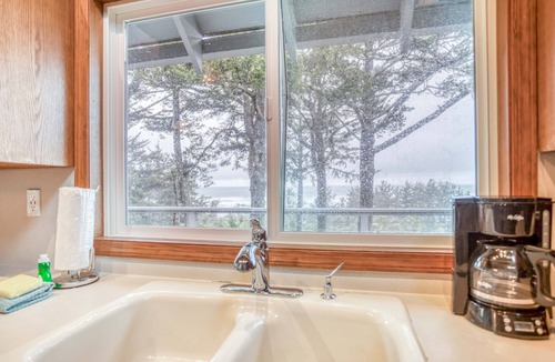 Sandpiper Village House | Stupendous Views Over Forest to Sea, Hot Tub, and game room in This Family Home!