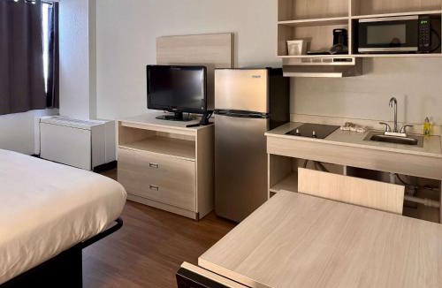 East Syracuse Hotel | Suburban Studios East Syracuse Carrier Circle