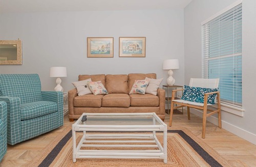Rockport Condo | Sweeping views of Copano Bay from this newly constructed ground floor condo with a pool and a new fishing pier!
