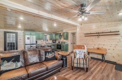Thompsonville Cabin | The Cozy Cabin with a private hot tub, screened porch, W/D & AC - dog-friendly
