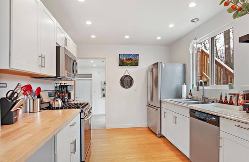 Lauderdale Lakes House | The Red Lodge - Unique Gem Near Lakes with Game Room and Hot Tub!