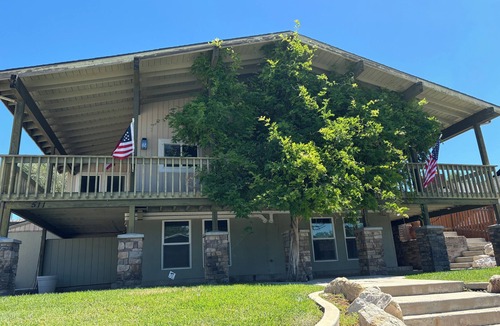 Sunset Heights House | The Treehouse: Spacious Retreat with Theater Room, Fire Pit & Mountain Views