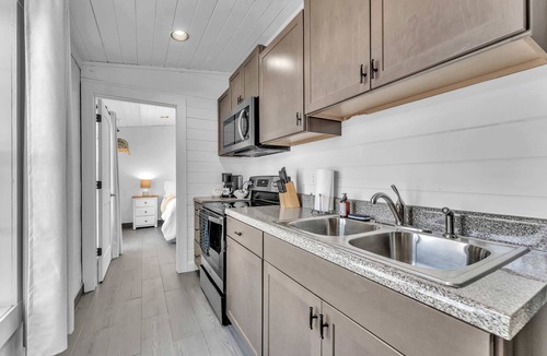 South Pittsburg Cabin | This is IT Cabin with a hot tub, fire pit, & indoor pool!