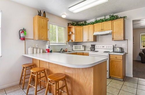Harbor Village Condo | Tri-level condo w/shared pool, hot tub, sports courts, & views of Bear Lake