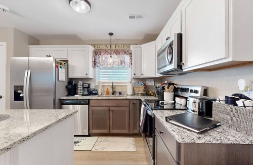 Clarksville House | Two-story home with private yard, patio, firepit, grill, & W/D