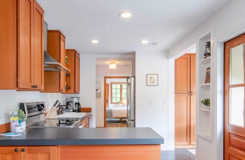 Neahkahnie Beach House | Unique one level home with a european feel. Fenced yard, hot tub and a short distance to the beach!