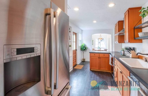 Neahkahnie Beach House | Unique one level home with a european feel. Fenced yard, hot tub and a short distance to the beach!