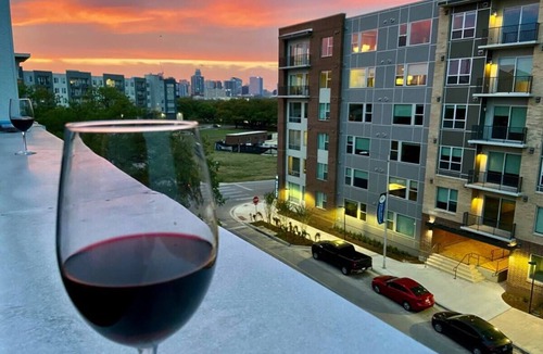 Riverside House | Urban Elegance: Luxury 4-Story Downtown Brownstone with Views & Free Parking