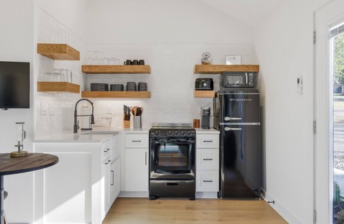 Gallatin House | Urban Rustic Boathouse on Cove