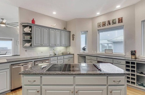 Sand Point House | Wake Up to Ocean Breezes: Elevator Access, Beach Views, and a Boardwalk to Paradise.