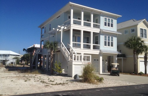 Navarre Beach House | Waterfront Home with Golf Cart, Kayaks, Bikes and Paddleboards!