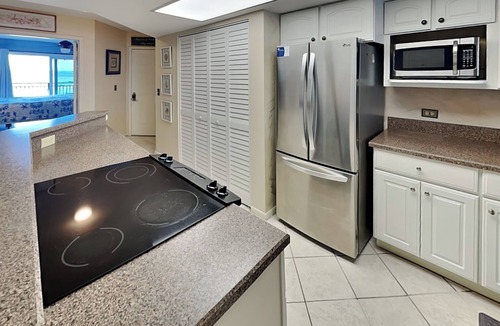 Crescent Beach Condo | Windjammer 412 | Oceanfront Condo with Balcony, Resort Pool, Tennis, Grill Area