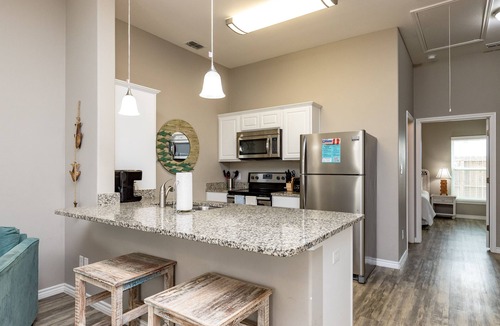 Corpus Christi House | Your Perfect Pet-Friendly Getaway: Heated Pools and Steps to the Beach