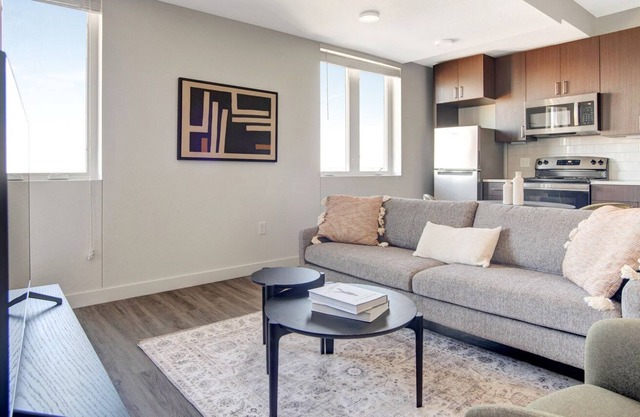 Airy Five Points 1BR w/ Roof Deck & Gym, walk to RiNo bars, by Blueground
