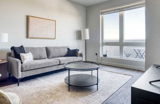 Airy Five Points 2BR w/ Roof Deck & Gym, walk to RiNo bars, by Blueground