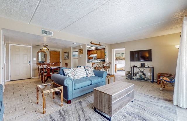 Bay-view all-suite condo with pool & fishing dock - walk to beach