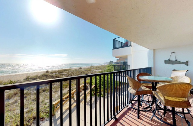Breezy condo with ocean views and shared pool - near beaches and restaurants