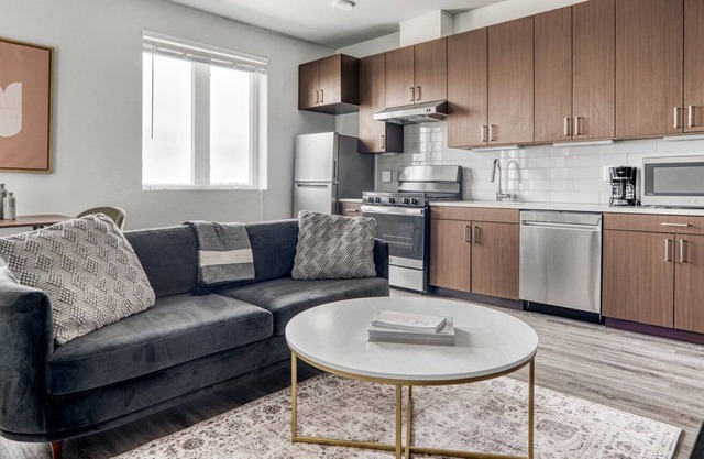 Chic Five Points 1BR w/ Roof Deck & Gym, walk to RiNo bars, by Blueground