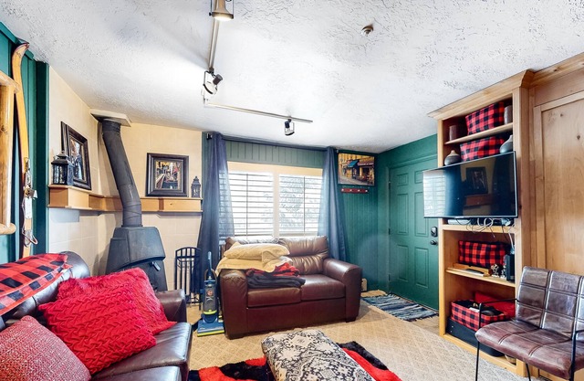 Cozy, Third-Floor Condo Near the Slopes w/ Free WiFi, a Wood Stove, & Views