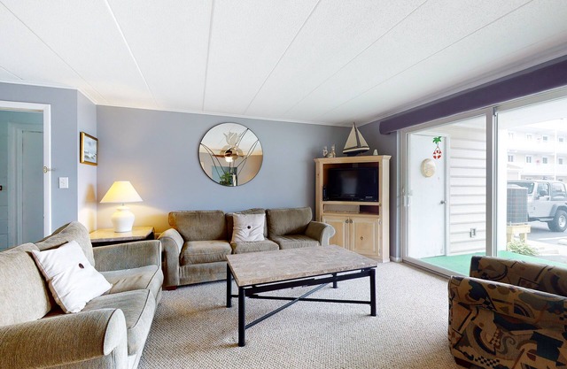 Ground-Floor, Bayside Condo with Patio, WiFi, Central AC, W/D & Shared Pool