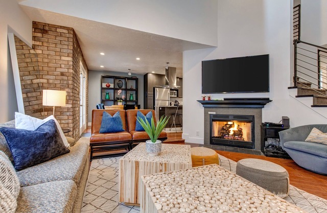 Large condo w/gas fireplace, private hot tub, gourmet kitchen, foosball