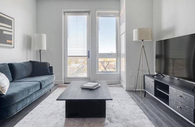 Luxe Five Points 2BR w/ Roof Deck & Gym, walk to RiNo bars, by Blueground
