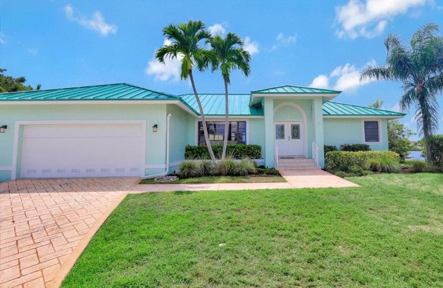 Pet-friendly waterfront home on key lot with view