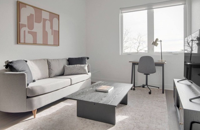 Sleek Sloan's Lake 1BR w/ Gym, W/D & Roof Deck, near Park, by Blueground