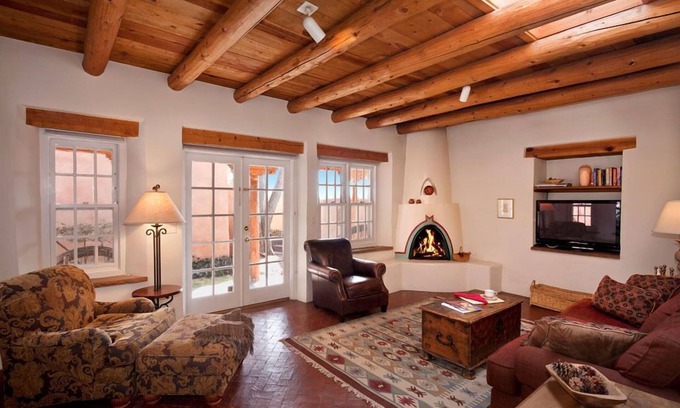 Historic Eastside House | Authentic Southwest Elegance ~Walk to Plaza, Kiva Fireplaces, Private