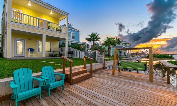 Port Isabel House | Bayfront Home with Shared Pool, Dock, Balcony, Playground and Washer/Dryer