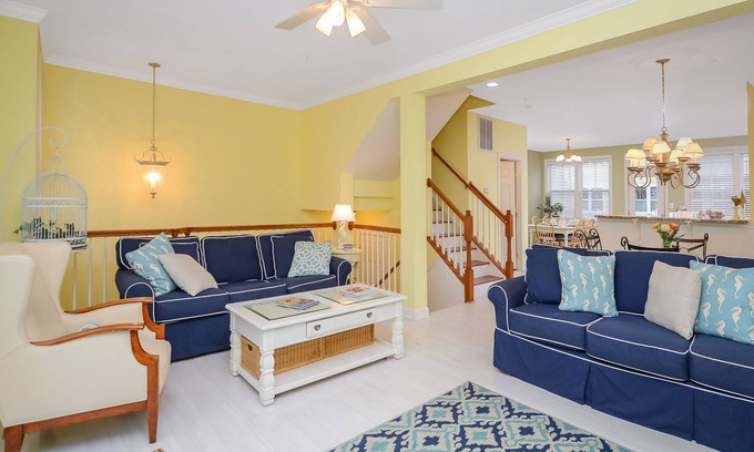 Sunset Island House | Bright, fun 5-bedroom townhouse in exclusive gated community with free WiFi, an indoor/outdoor pool, private bayside beaches, a restaurant, and more!
