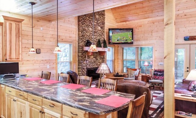 Cosby Cabin | Creekfront cabin with cozy interiors, hot tub & game room.